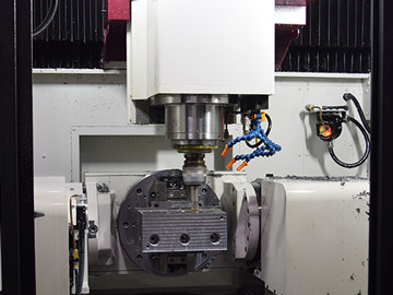 Simultaneous five-axis control processing machine 